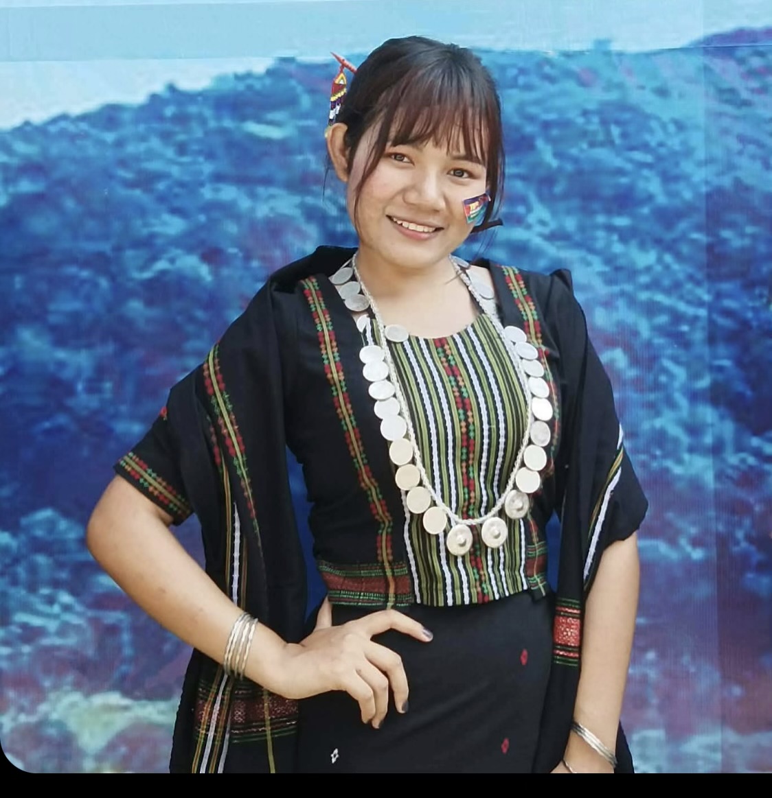 Khongso woman wearing traditional clothing and ornaments